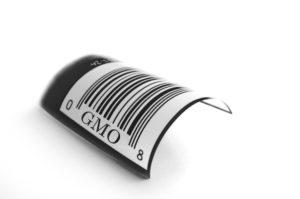 closeup of a GMO UPC symbol on white