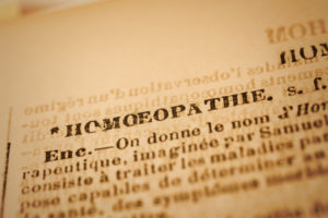 Close up of the word HOMEOPATHIE in an old French dictionary. Selective focus and Canon EOS 5D Mark II with MP-E 65mm macro lens.